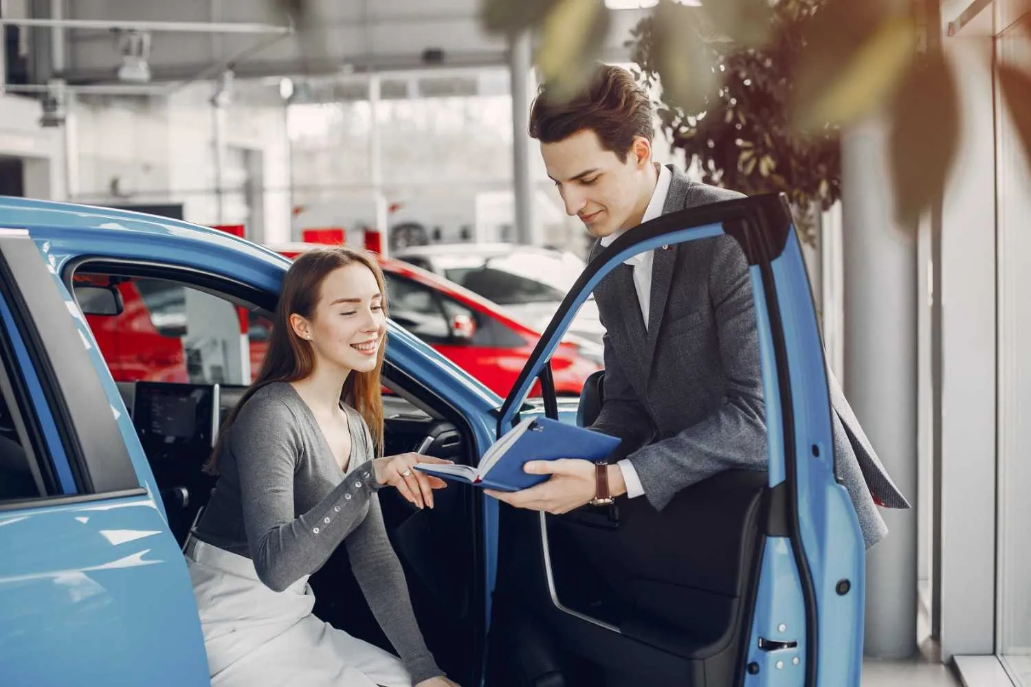 Driver reviewing vehicle insurance options